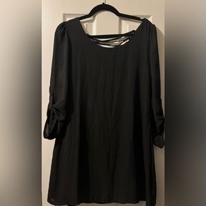 Classy little black dress with lace-up back.